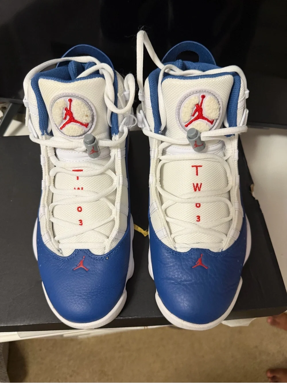 Jordan men’s White, Blue & Red Retro Basketball Sneakers worn twice like new